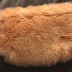 Fuzzy pink clutch! Photo 0