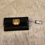 Guess π Black with Tan Accent Buckle on Front Wallet Photo 3
