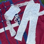 2 piece festival white feather set pants and cropped wrap top
Women’s S small Photo 0