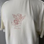 Darc Sport SHE Cherub and the Skull Pump Cover Tee, Cream. XS Photo 1