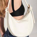 TIE KNOT CROISSANT BAG Photo 0