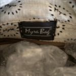 Brown and Cream Patterned Myra Backpack with Leather Accents Photo 1