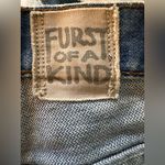 Furst of a Kind  Distressed Denim Skirt with Unique Side Straps Photo 4