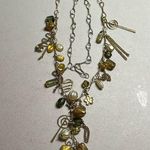 Charm necklace with earth, tone beads Brown Photo 3
