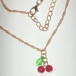 Gold Tone Red and Green Boho Cherry Pendant Necklace Photo 0