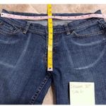 EXPRESS  distressed medium wash denim flare j… Photo 2