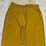 Athleta  Brooklyn Mid Rise Ankle Pants Pull On Outdoor Travel in Brass Yellow 6 Photo 6