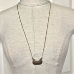 Gold tone long “purse” pendant necklace Photo 1