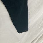 Tractr: Stretchy Skinny Jeans with red flannel covered holes Photo 11