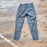 Athleta Trekkie North Jogger Pants Women’s Size 0 Olive Green Zip Pockets Hike Photo 1