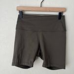 Nobull  high rise biker shorts olive green medium 6” Photo 6