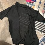 Isabella Rodriguez  small black cardigcan top Photo 4