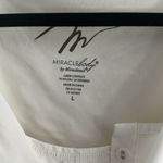 MiracleSuit medium top slimming tank top beneath a lovely rayon flowy top Photo 1