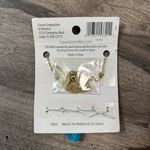 Charming assortment of 6 pieces, including a blue tassel, elephant, and more Gold Photo 2