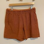 Athleta Echo Shorts in Burnt Orange size 12 Photo 1