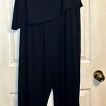 Trina Turk Trina Turk Black Jumpsuit with Long Sleeves and Relaxed Fit Photo 2