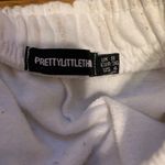 Pretty Little Thing white sweat shorts Photo 1