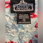 Angie Beautiful patterned romper with flowy skirt. Size S. Photo 3