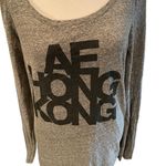 American Eagle Gray with Black Glittery Letters “AE HONG KONG” Long Sleeve Top L Photo 1