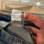 Hammer Jeans  light wash distressed denim mini skirt with pearls. Photo 6