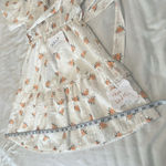 Simplee Apparel NWT Simplee Floral Surplice Neck Dot Belted Lace Trim Layered Hem Schiffy Dress Photo 10