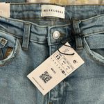 Muse Looks Distressed Mid Rise Slim Flared Classic Fit Mom light wash Jeans Blue Size undefined Photo 6