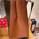 Michael Kors  Elegant Black and Tan Handbag Photo 5