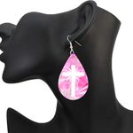 Black Teardrop Earrings with Floral Cross Design Photo 1