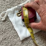 Coach Burgundy Leather air pod holder with Gold Hardware magnetic closure Photo 5