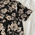 Forever 21 Black Curved Hem T-Shirt With Beige Floral Print Photo 2