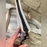 THINK ROYLN bum bag in white patent Photo 9