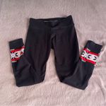 Victoria's Secret Victoria’s Secret black leggings with snowflake design Photo 3