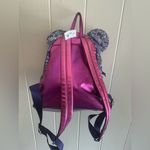 Lounge Fly A Very Rare Disney Parks  Purple Potion Glitter NWT Retired Backpack Photo 4