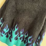 Adika Black and Blue Flame Sweater Photo 1