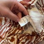 Anthropologie love the label zebra laser cut puff sleeve smocked blouse Photo 3