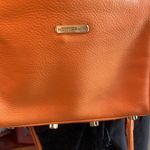 Rebecca Minkoff orange leather tassel fringe crossbody with gold hardware Photo 3