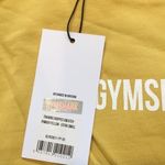 Gymshark Women’s Powder Yellow TRAINING CROPPED SWEATER Top size XS Photo 6