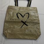 Victoria's Secret Gold Tote Bag Elegant and Versatile Photo 0