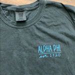 Alpha phi T Photo 1