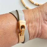 Set Saachi grey leather goldtone loop wrap bracelet and matching necklace. Gray Photo 2