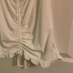 B. Wear  top Photo 3