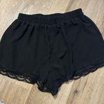 Lush Clothing Lush size small super comfy elastic waist band shorts with lace on the bottom Photo 0