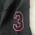 U.S. Polo Assn. Women’s Black and Pink Polo Shirt  Photo 2