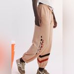 Free People #15 NWT All Star Logo Pants in Pastel Peach Sport Mode Photo 1