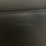 Calvin Klein Chic Black Shoulder Bag with Gold Accent Like New Photo 3