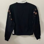 Good American  Peepin’ black grommet sweatshirt size M Photo 2