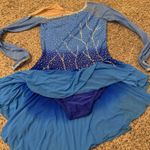 Reveal Dazzle in this blue sarong with shimmering rhinestones. Ideal for beach elegance. Photo 3