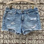 American Eagle AEO Tomgirl Shortie distressed frayed jean shorts Size 4 Photo 0