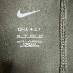 Nike  Women's Dri-Fit Buckle Crop Tank Photo 3