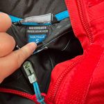 Salomon  Speed Jacket Coat in Poppy Red Size Small Photo 1